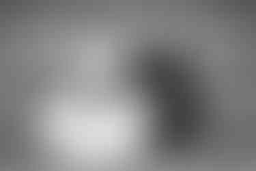 natural and elegant photo of a wedding couple sat on steps