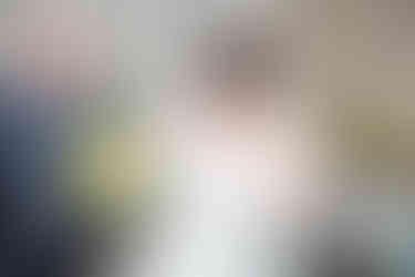 Natural Wedding Photography in Swansea, Carmarthen and The Gower of Bride's Dress and tweaks