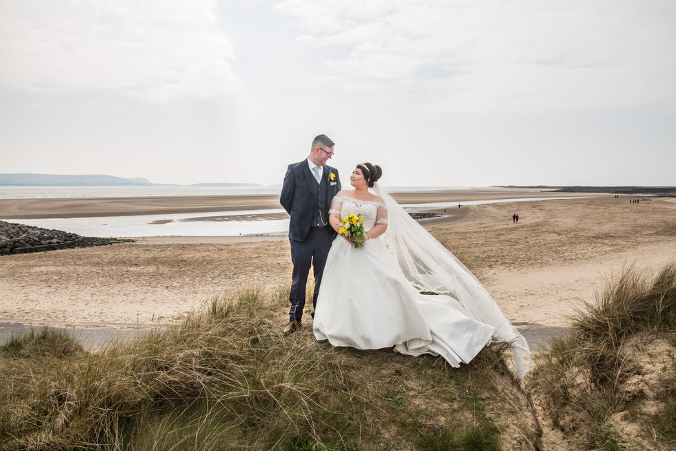 Bride and Groom Photography with the Gower and Swansea Beach behind
