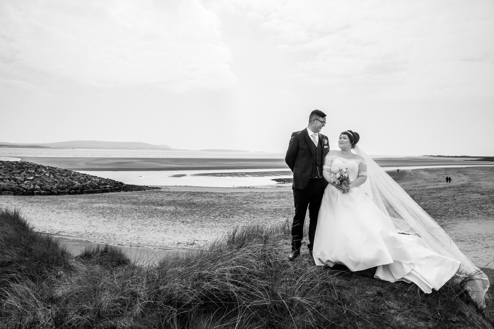 Bride and Groom Photography with the Gower and Swansea Beach backdrop