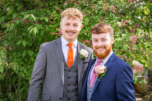 Groom and his brother pose for a swansea wedding photographer