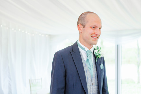 natural wedding photography of groom at sylen lakes
