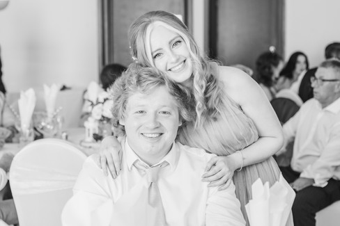 man and woman hug at a swansea and gower wedding ceremony