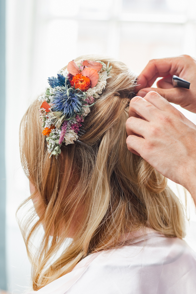 Close up of bridal wedding hair with autumnal flower headband