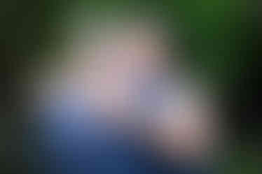 bride embraces wedding guest in swansea bay