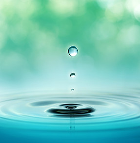 This is a background graphic in a circle shape showing drops of water and the waves they create.