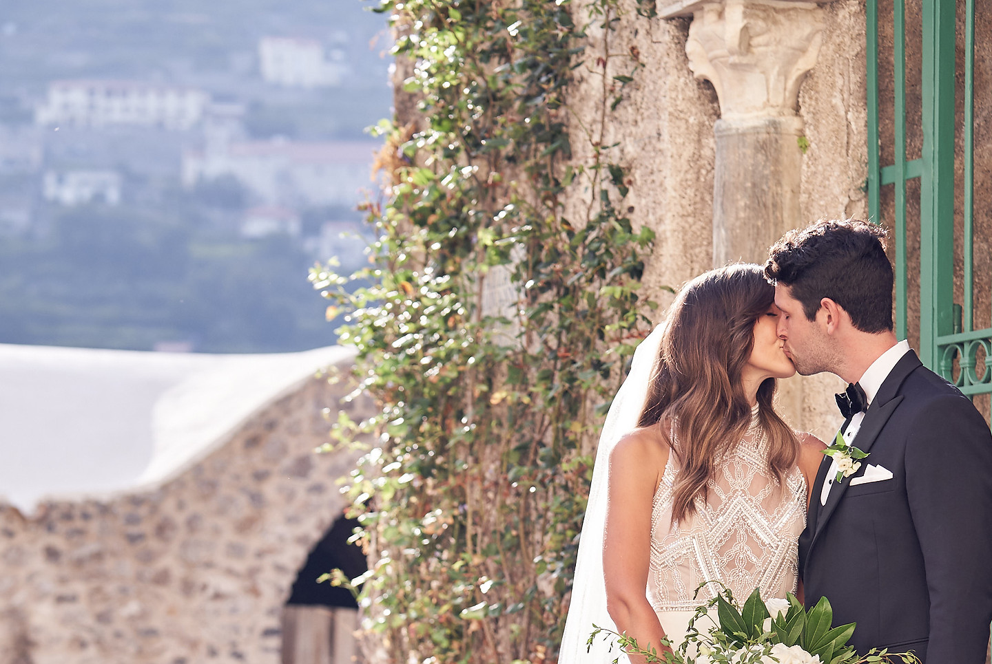 Sunlit ceremony overlooking the Amalfi cliffs, perfect for a luxury Italian wedding