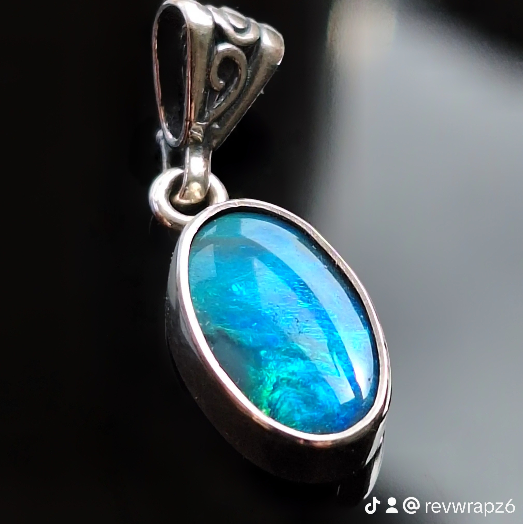 Lightning Ridge opal doublet pendant with strong blue and green fire. front view