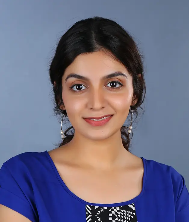Aditi Headshot_WIRN page.webp
