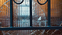 Photo of a broken glass window by Beth Macdonald on Unsplash