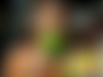 Gym gitl drinking green juice surrounded by toxic makeup