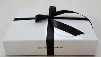 Grever & Grever Solid Sterling Silver Belt Buckles packaged in glossy white hard box