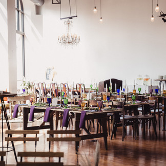 Grand view of The Loft of Elements Peserved 24 arm hanging chandelier