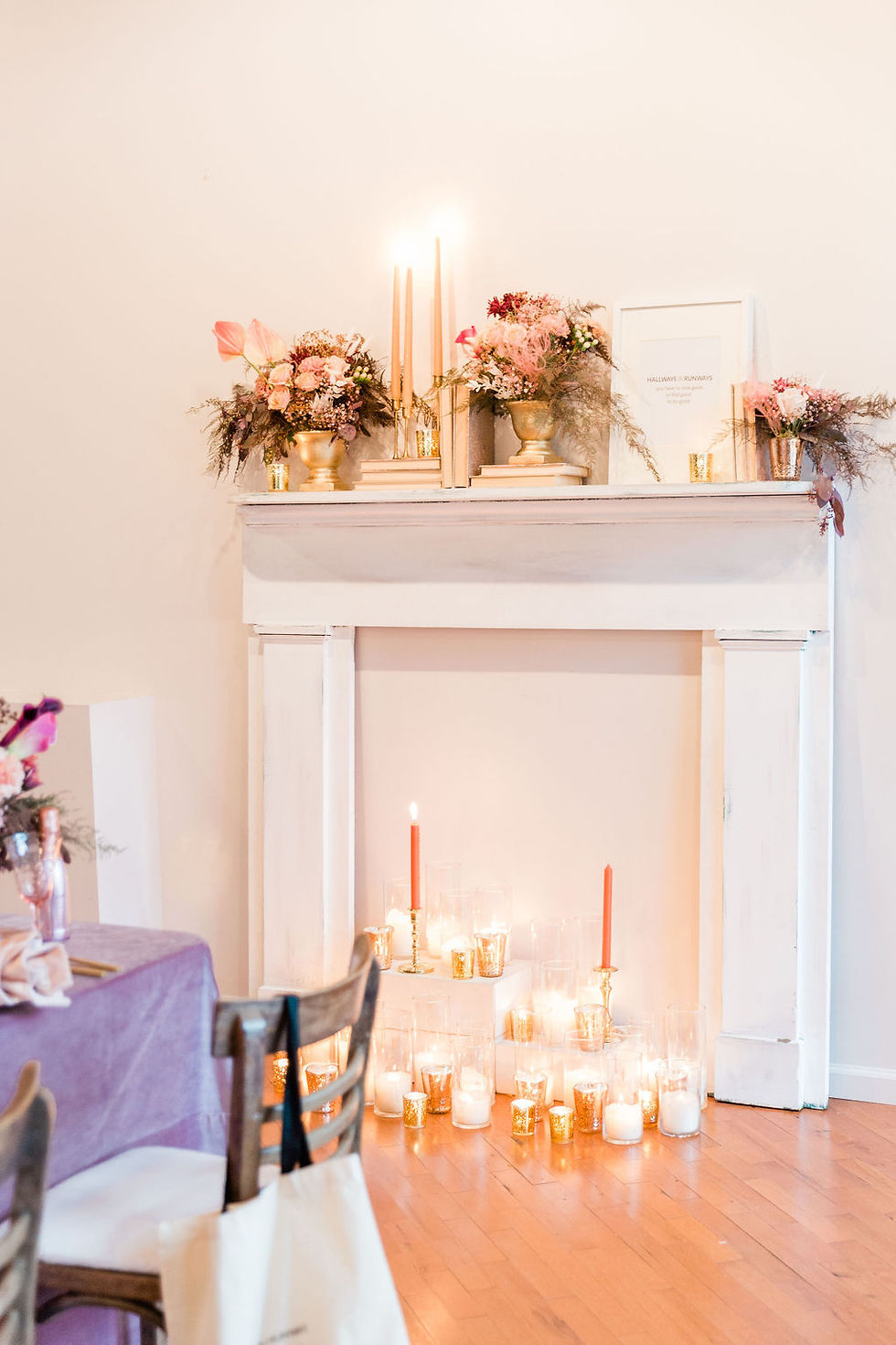 Mantel backdrop presents a unique way to add a personal touch to your event, including books, floral, and candlelight!