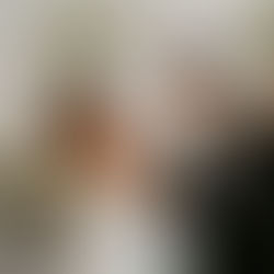 bride and groom raise hands in celebration following their ceremony vows in intimate ceremony