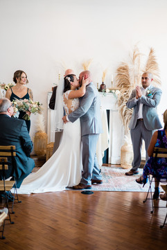 bride and groom's first kiss