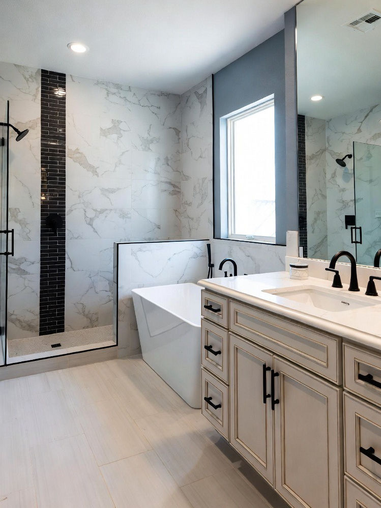 Custom bathroom remodel with walk-in shower, freestanding tub, and double vanity by PHRS Remodeling in San Antonio, Texas