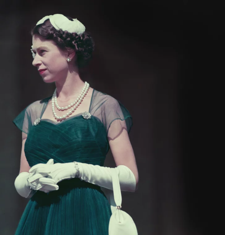The Queen wearing a green chiffon dress during her Australian tour of 1954