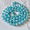 Thumbnail: 1960s Vintage Blue Iridescent Bead Necklace