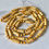 Thumbnail: 1960s Vintage Long Cinnamon Beaded Necklace