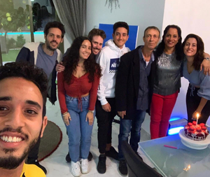 Olah Rosie Tourgeman standing with her boyfriends family for a selfie