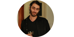 Peter Shamah holding a glass