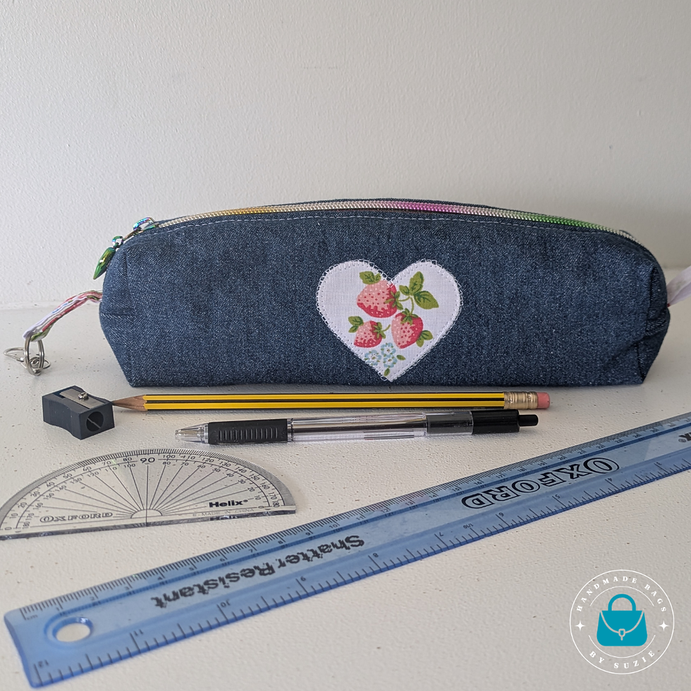 Thumbnail: Denim Strawberry Heart Pencil Case - Pictured with Stationery. (Stationery shown for display only and not included)