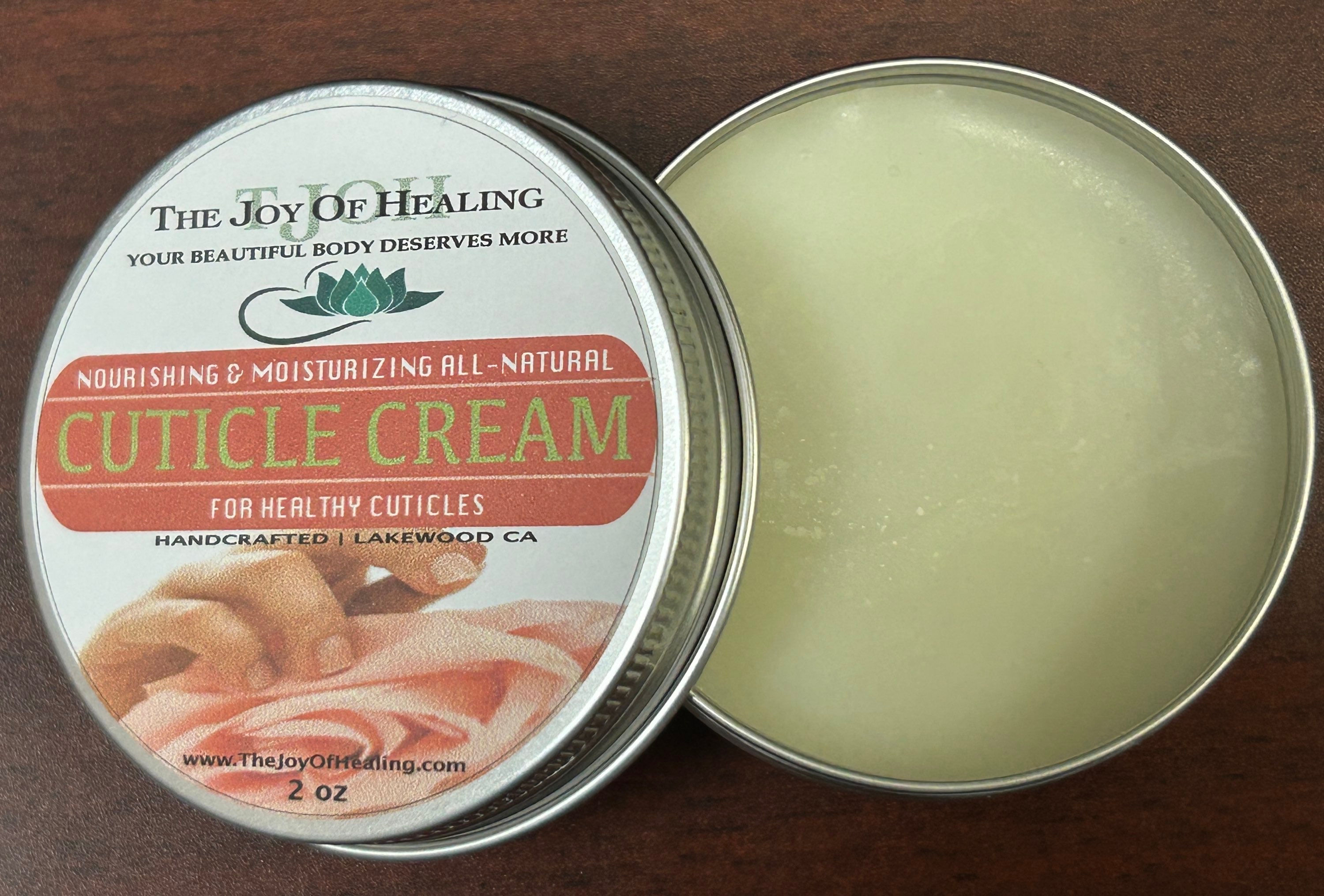 A handcrafted tin of All-Natural Cuticle Cream by The Joy of Healing with almond and jojoba oils.