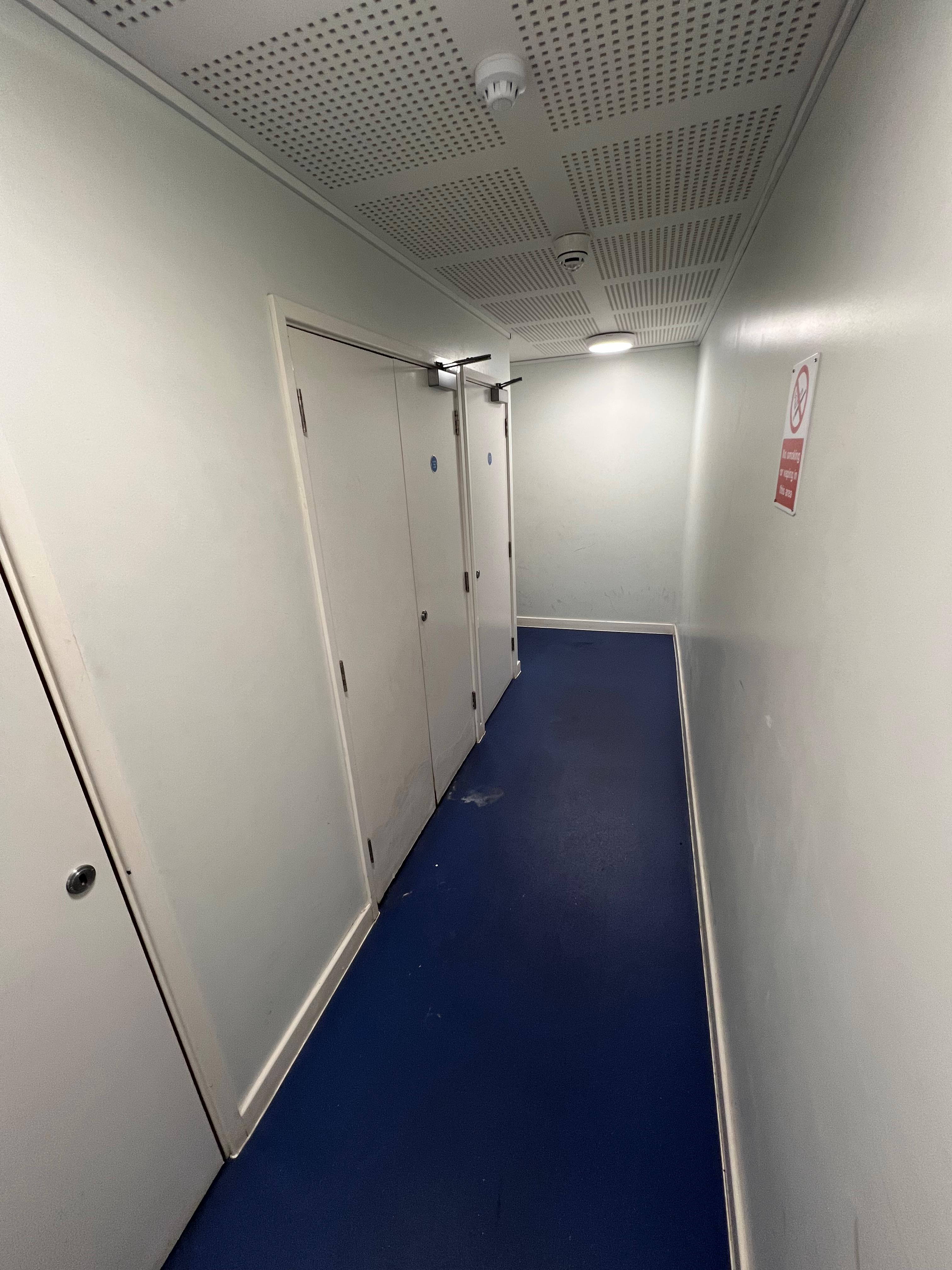 Corridor doors along the communal route, Smithfield Court