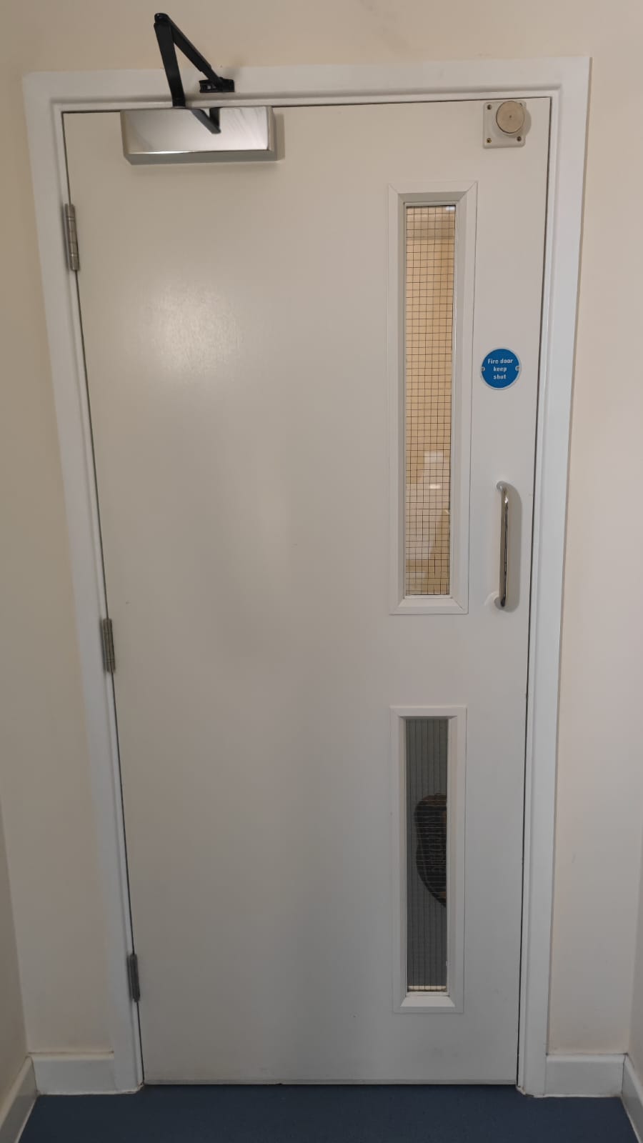 Corridor door with overhead closer, Ilsley Court