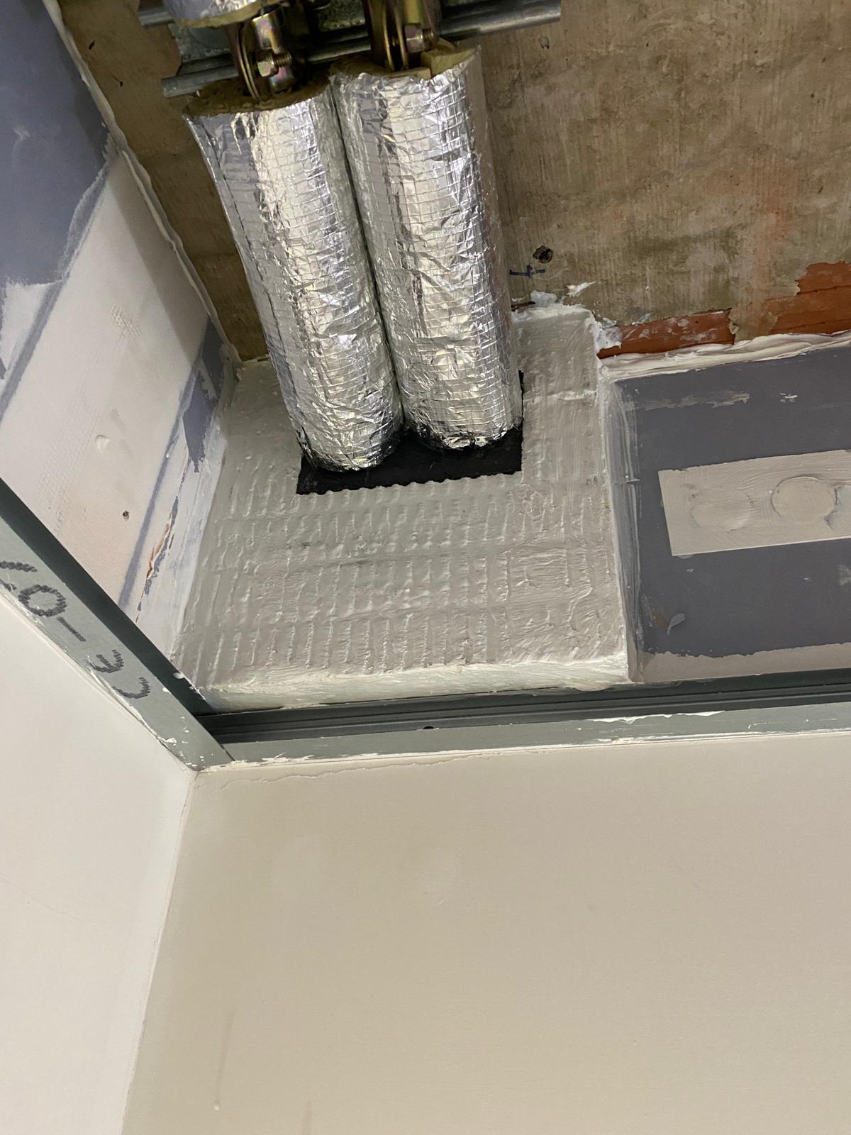 Insulated duct penetrations above the ceiling, Cobham firestopping project