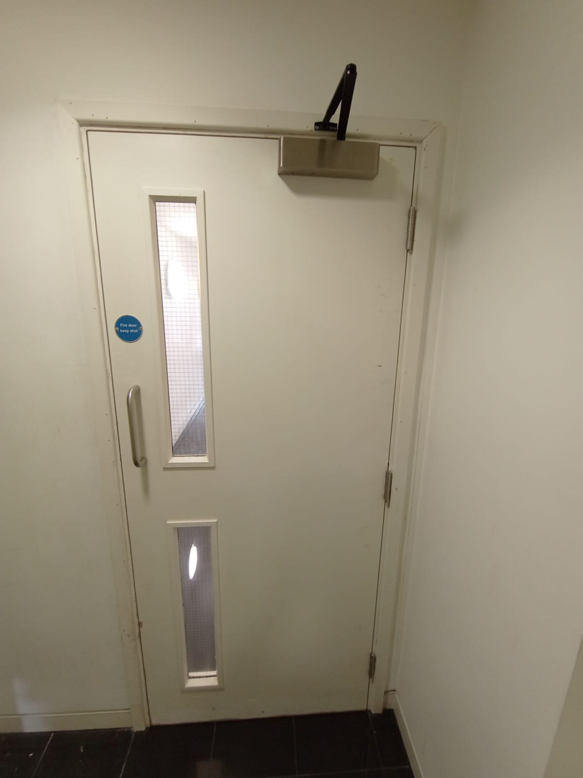 Corridor door and overhead closer, Blenheim Apartments
