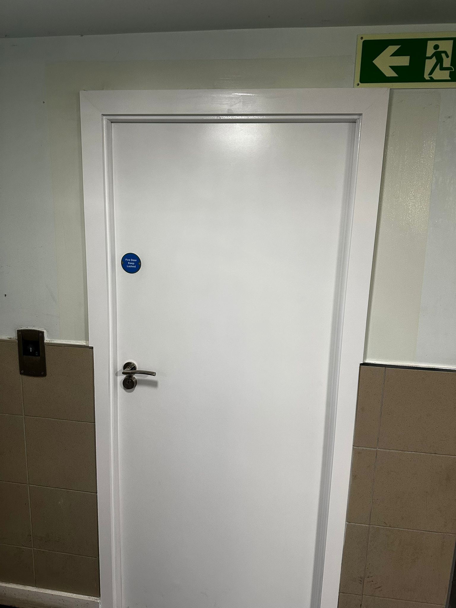 Single doorset beside the communal stair, Burlington Court