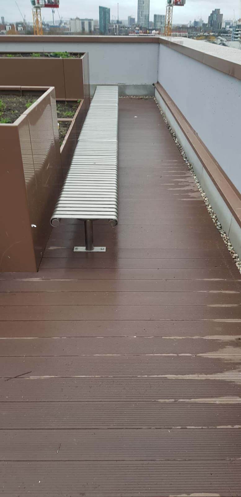 Terrace decking with timber framed benches, Reading Riverside