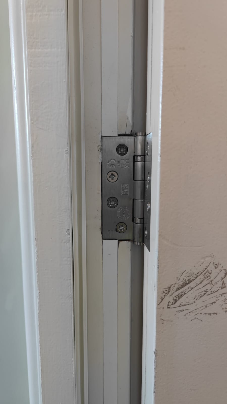 Hinge and frame detail during maintenance, Smithfield Court