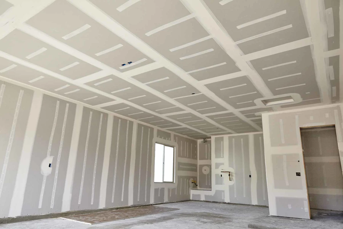 Plasterboard walls and ceiling with taped joints before decoration