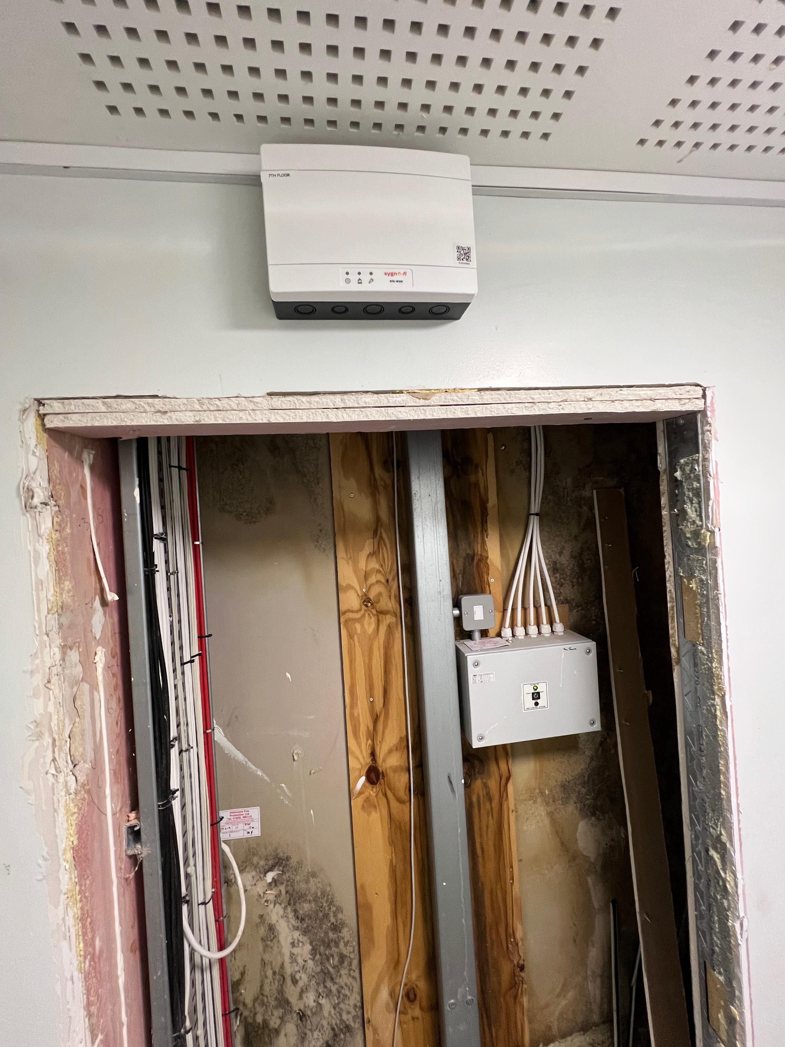 Service-door opening during frame replacement, Smithfield Court