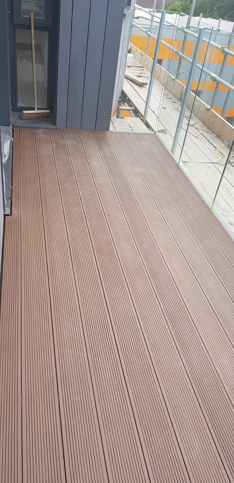 Balcony decking beside glazed balustrades, Reading Riverside