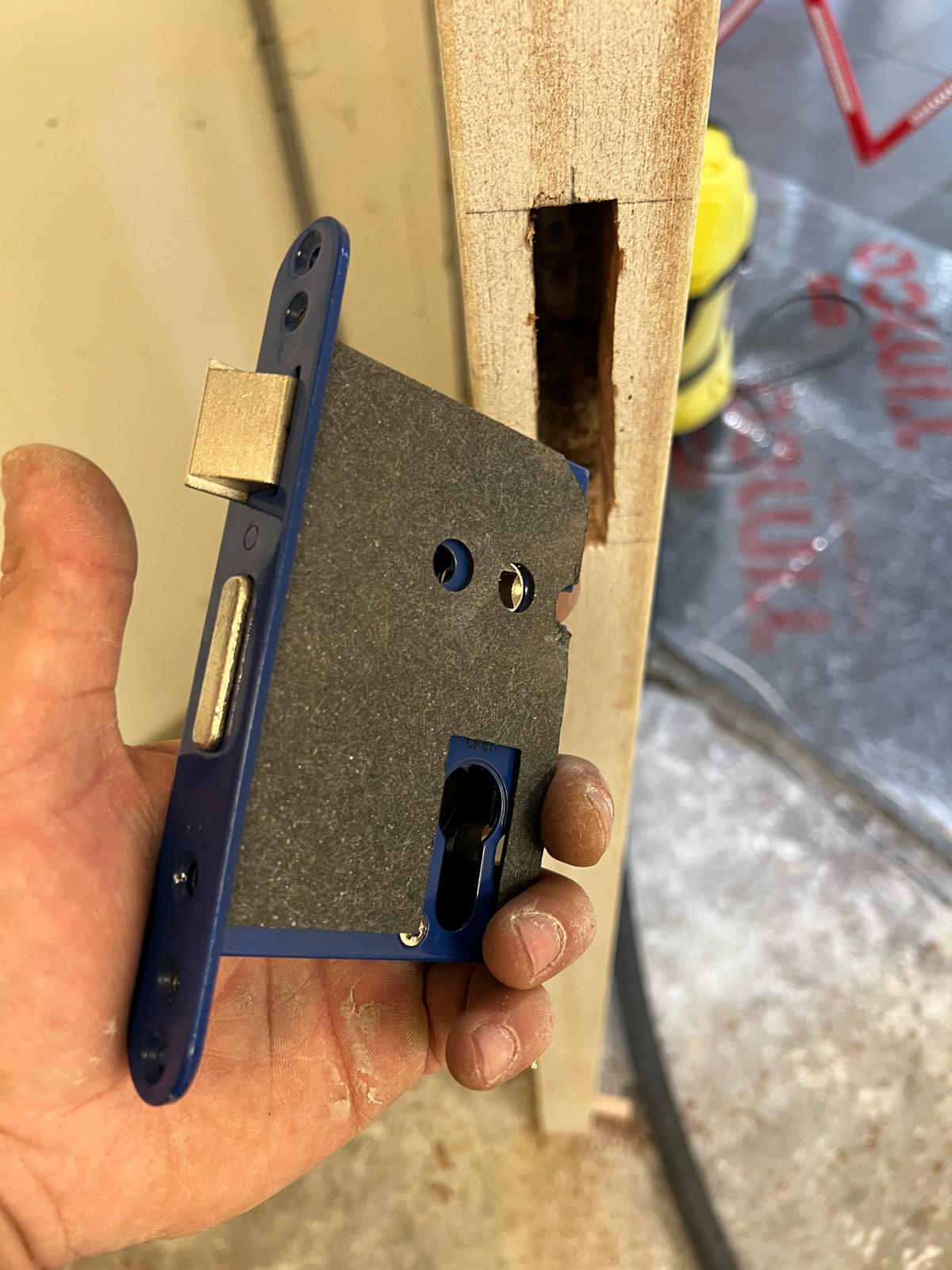 Lock preparation during door installation, Burlington Court