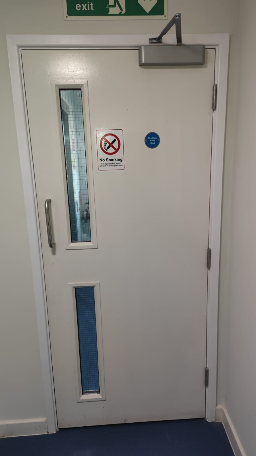 Glazed communal doorset with overhead closer, Smithfield Court