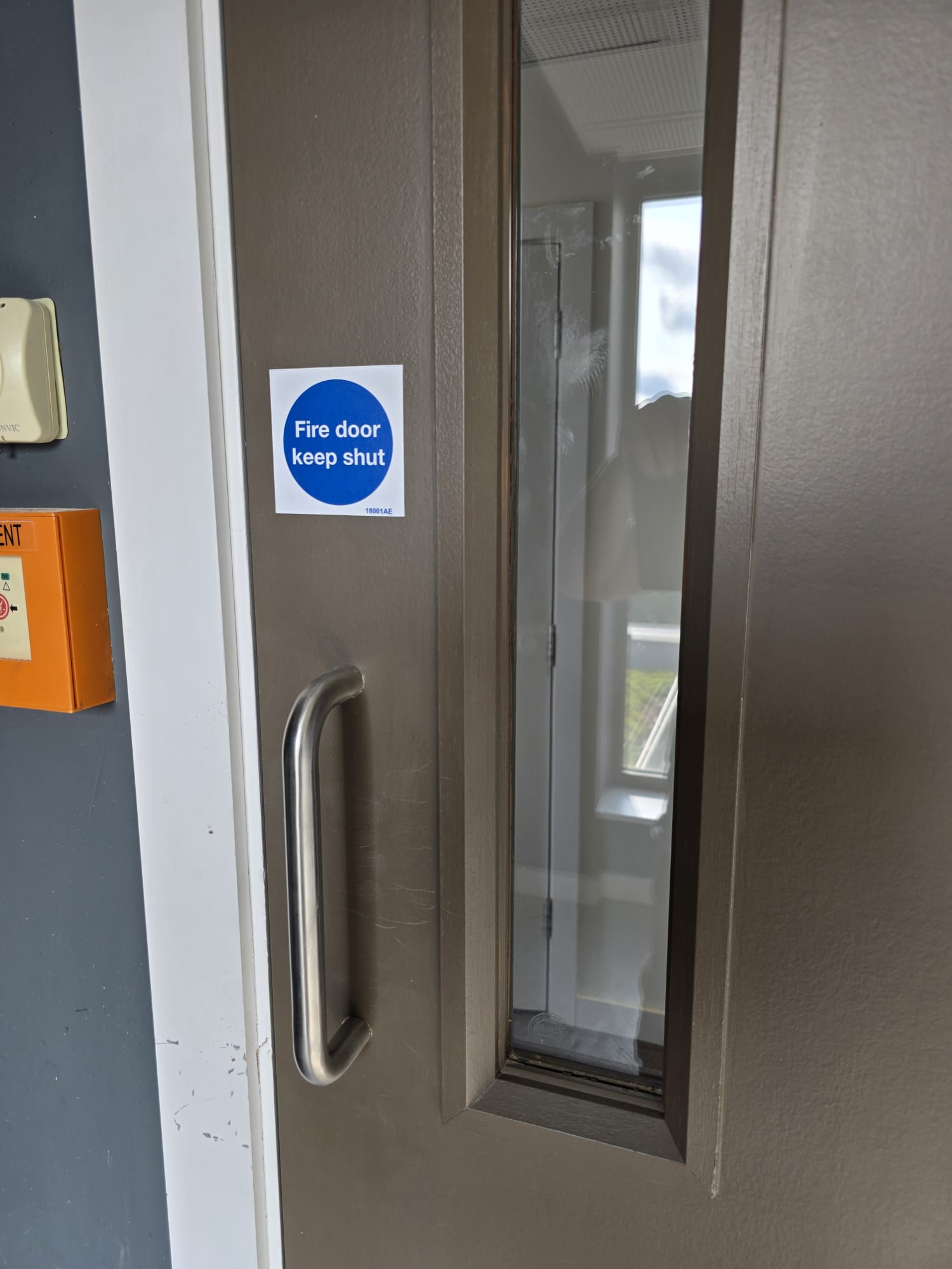 Door signage and pull-handle detail, Frampton Park