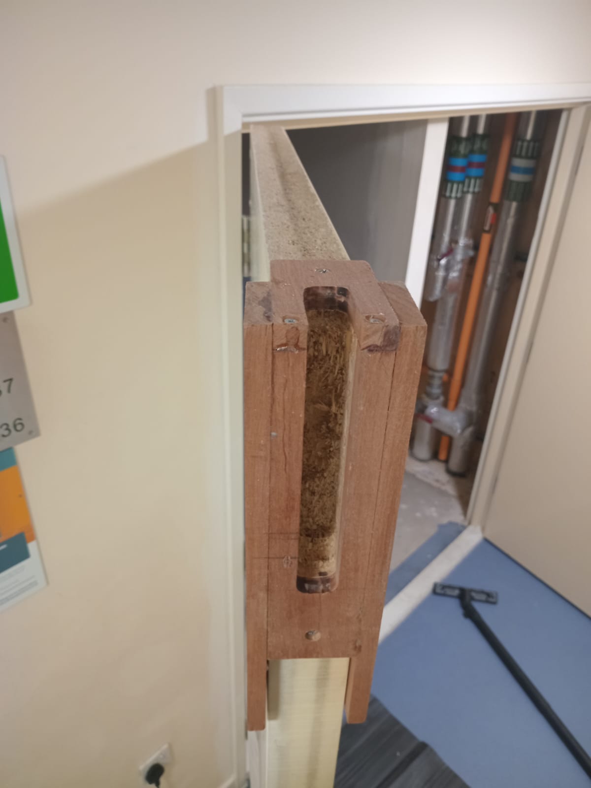 Door-edge preparation during lock maintenance, Tynee Court