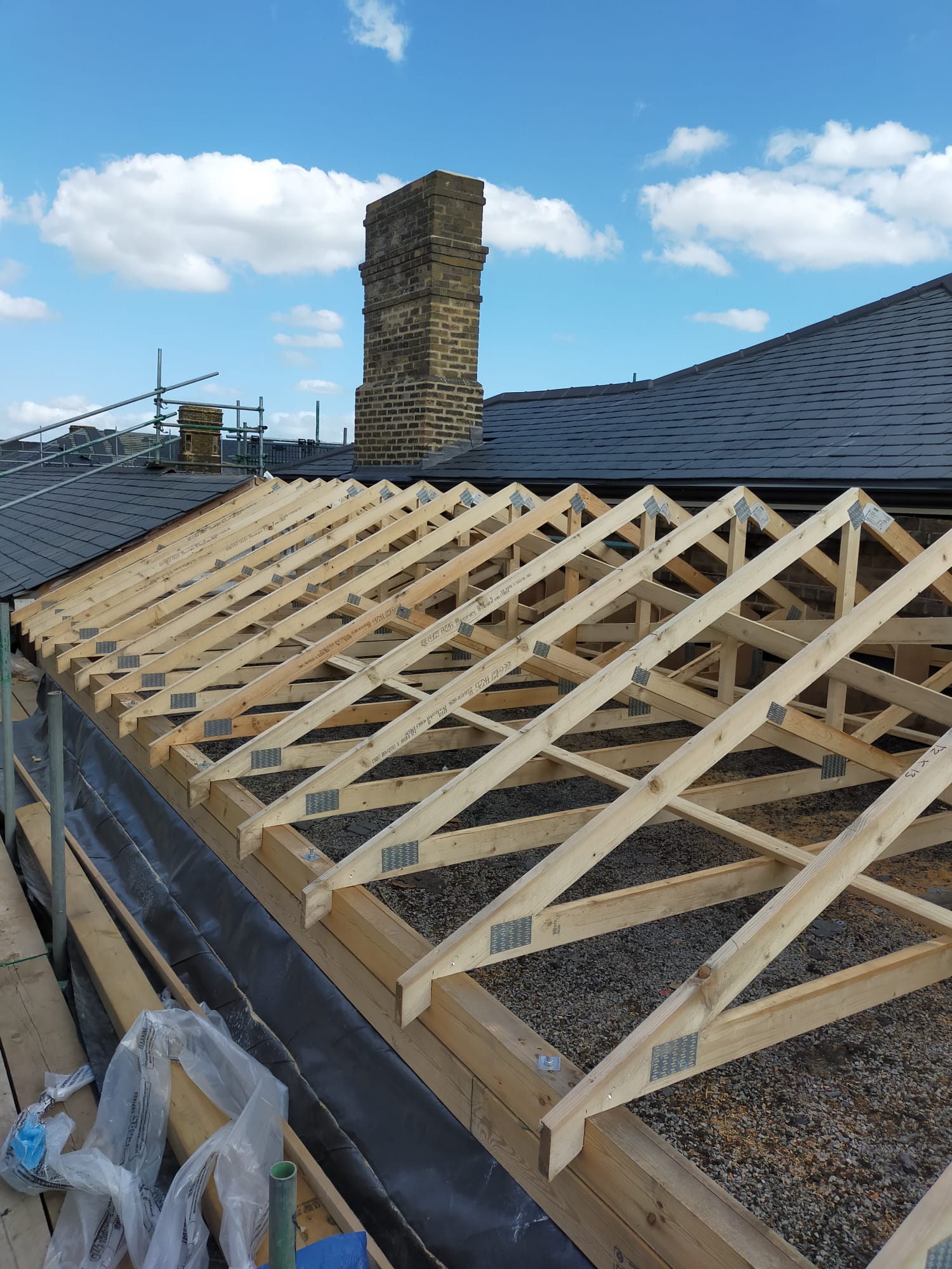 New roof framing beside an existing chimney, Cambridge Military Hospital