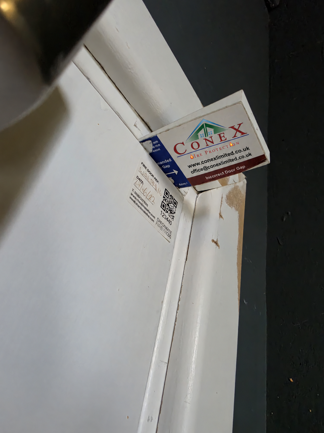 Checking the door clearance at the head, Warwick Apartments