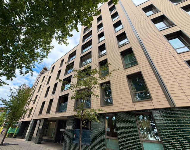 Oak Square residential building with pale cladding and dark brickwork