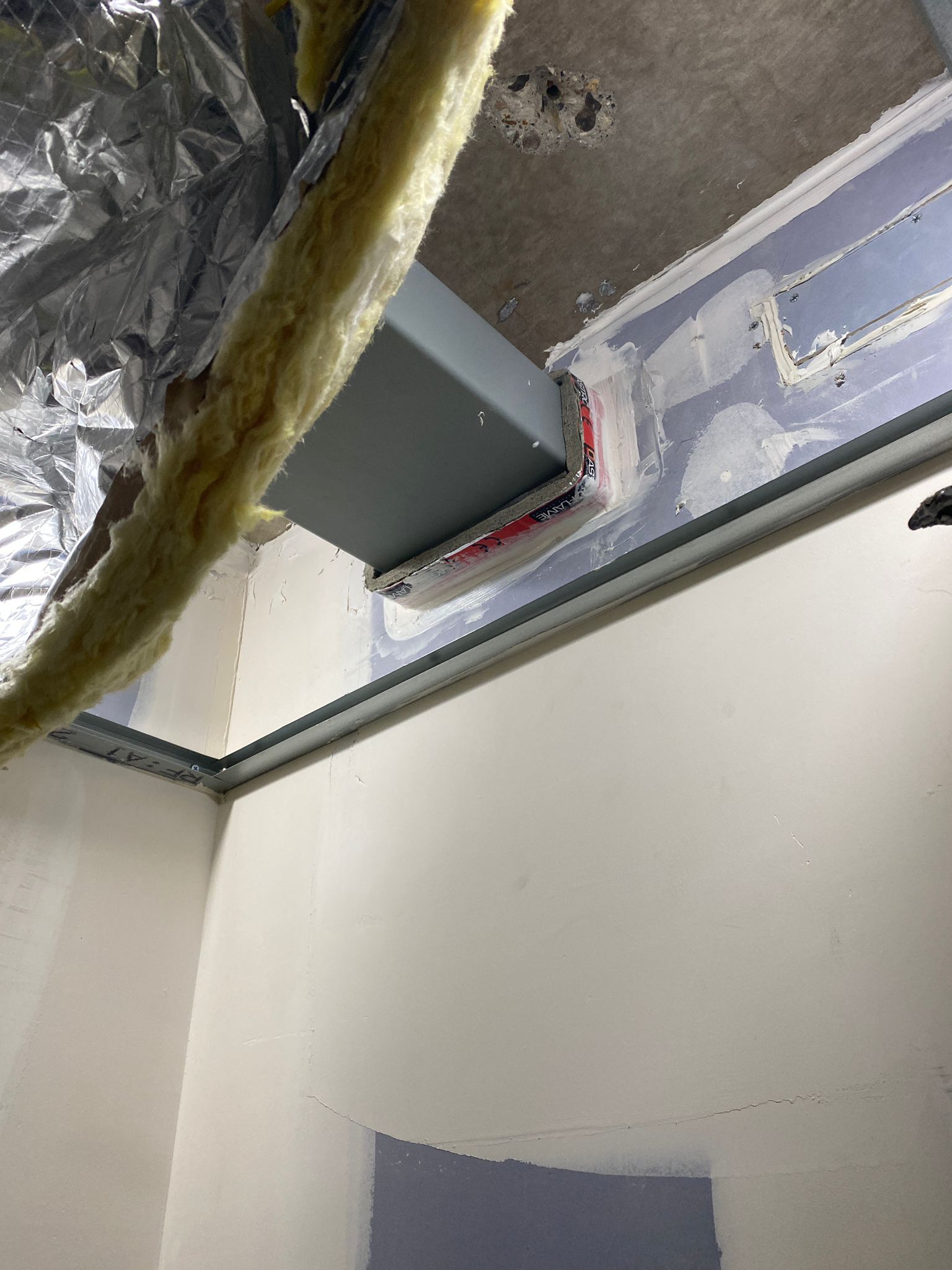 Rectangular duct interface at the wall head, Cobham firestopping project