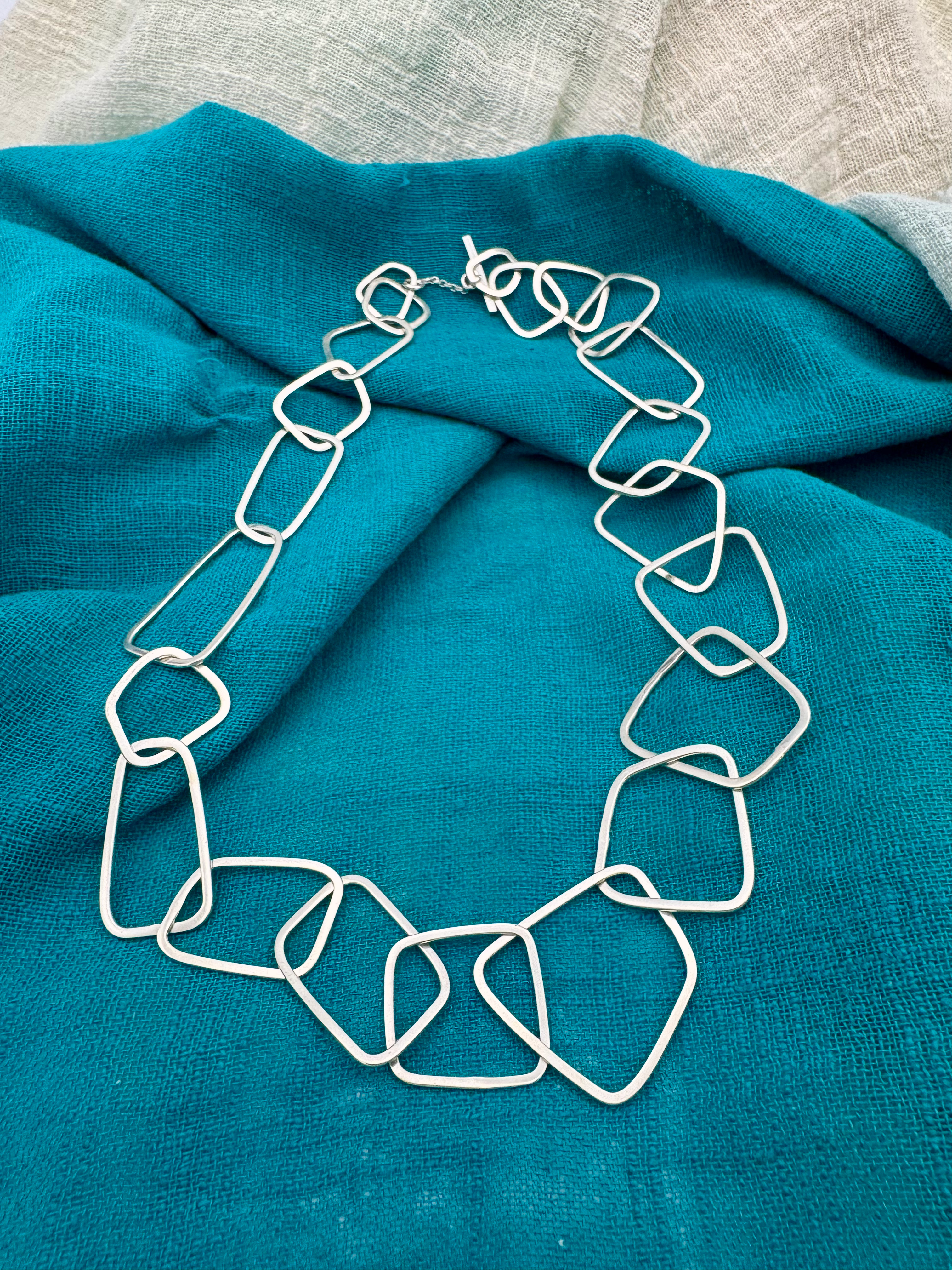 Hand Forged Sterling Silver “Chain Reaction S” Necklace 