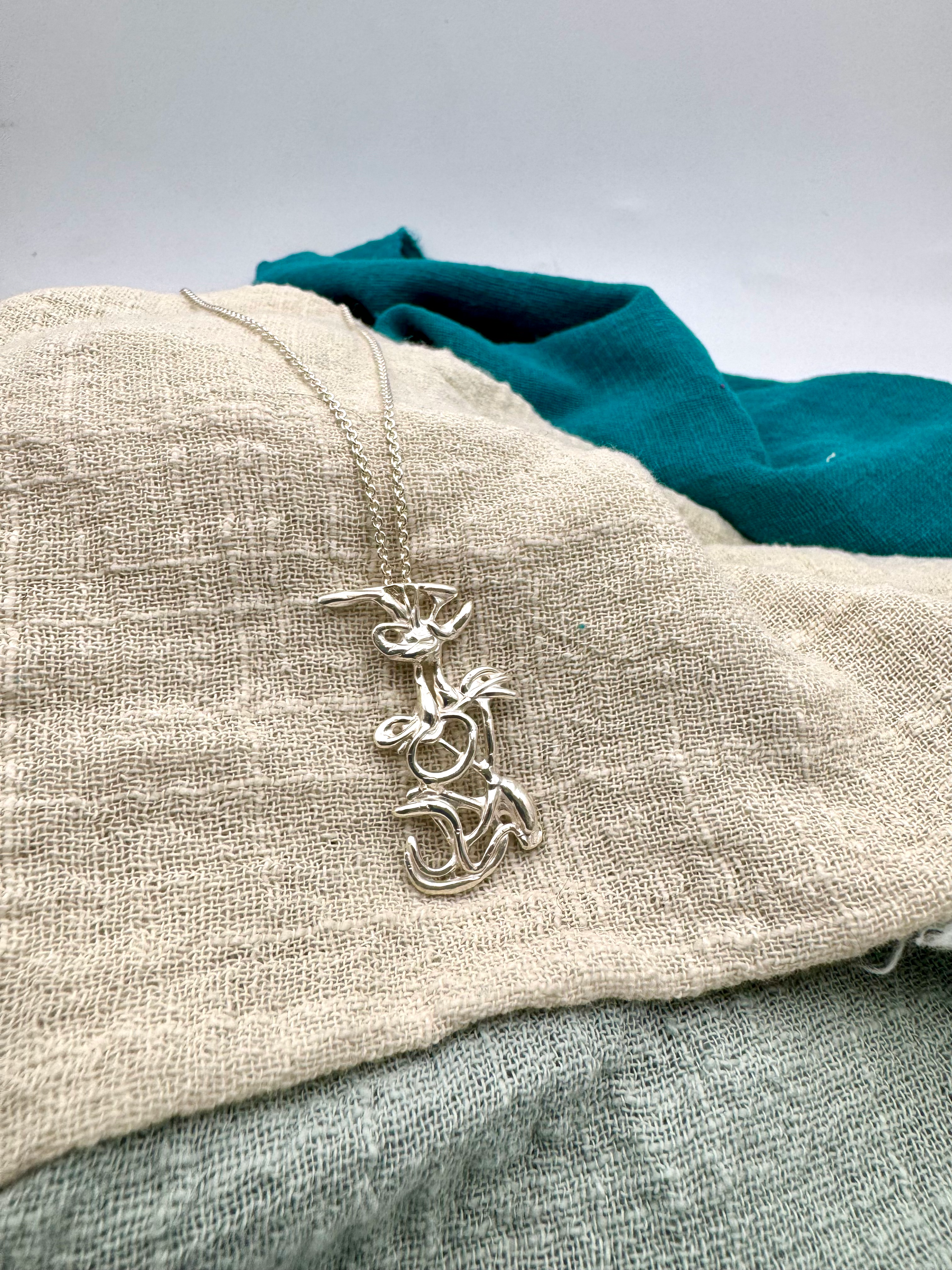 “Orient” Silver Pendant.