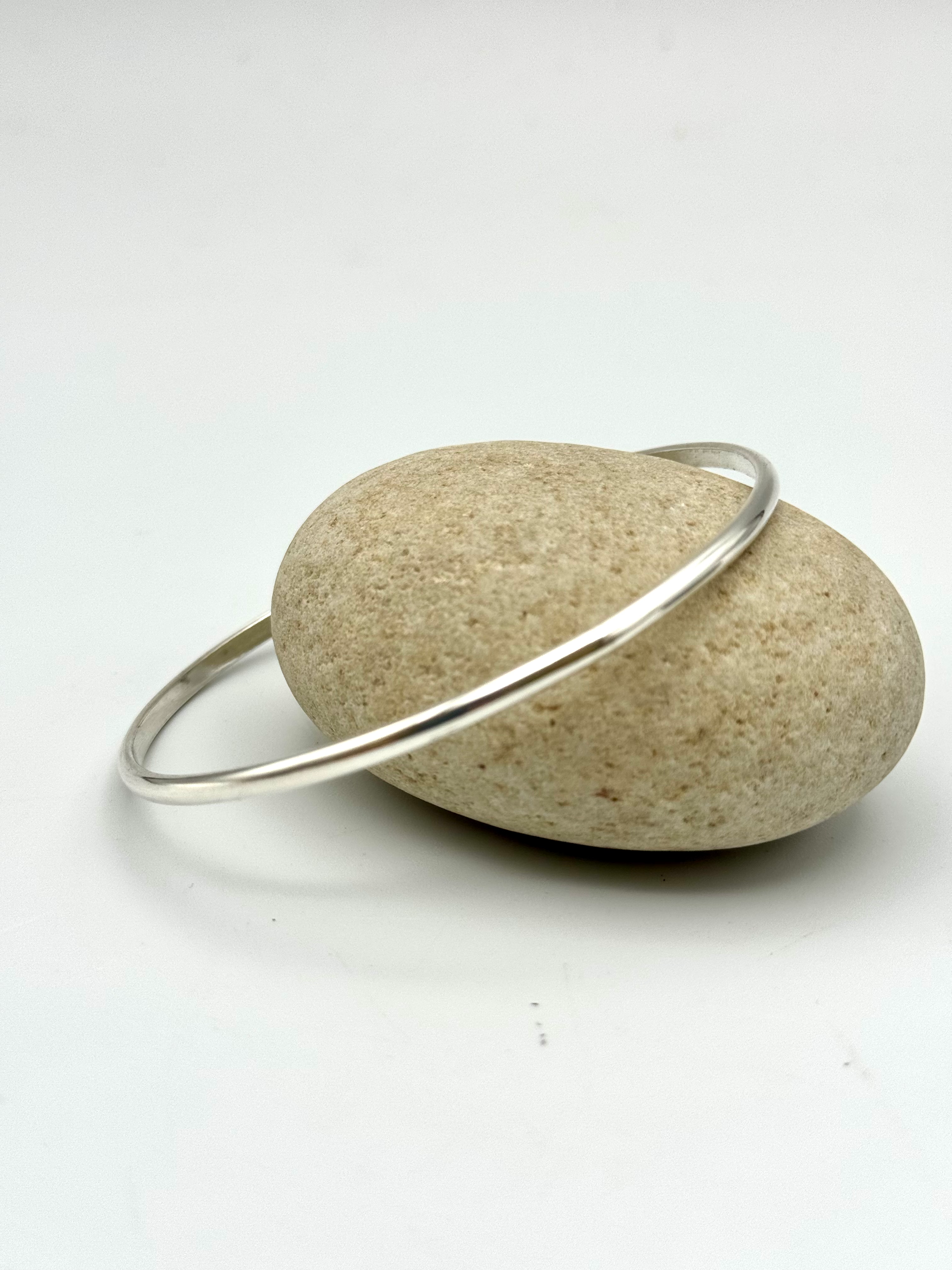 Handforged silver “Space” bangle