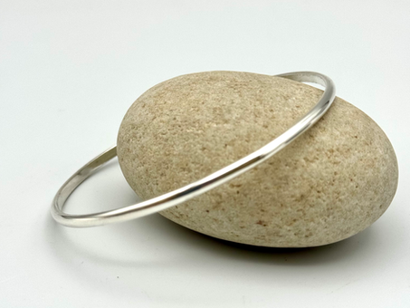 Hand-forged in my Dublin studio, this sterling silver bangle is a timeless piece, stunning on its own , or in a stack.